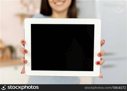 close up woman holding tablet. High resolution photo. close up woman holding tablet. High quality photo
