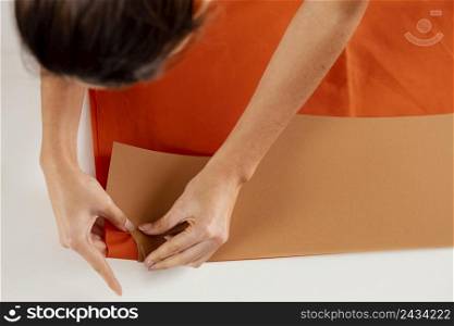 close up woman making clothing items