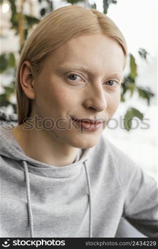 close up woman posing indoors