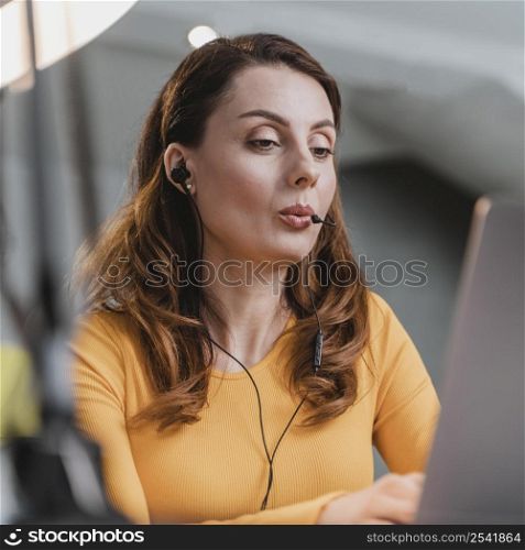 close up woman streaming with laptop