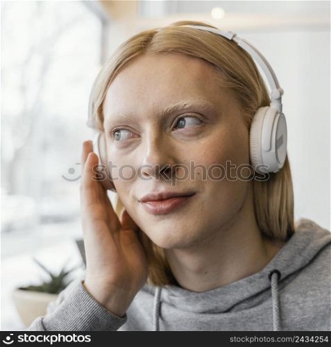 close up woman with headphones 2