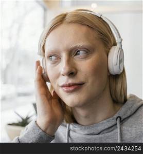 close up woman with headphones 2