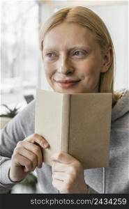 close up woman with notebook