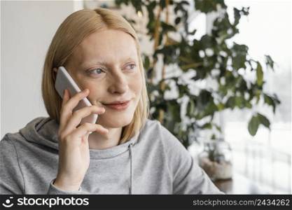 close up woman with smartphone
