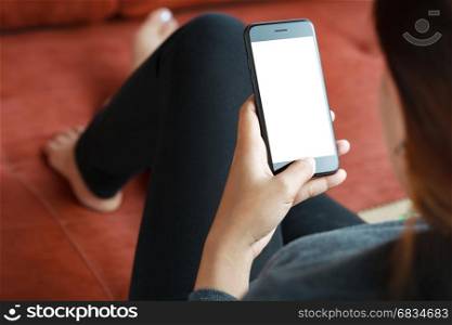 close-up women use smart phone mobile white screen on sofa decor