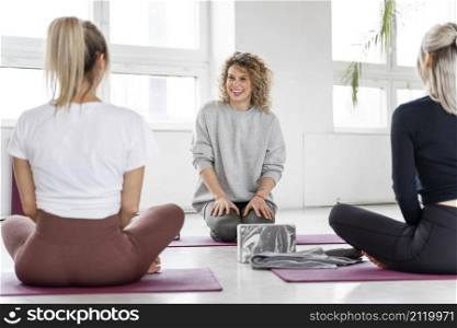 close up women yoga class