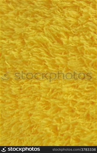 close up Yellow wool yarn background and texture