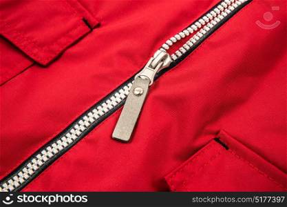 Close up zipper on a red background