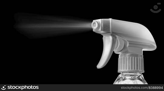 Close view of a plastic spray bottle’s head for dispersion isolated on a black background. With clipping path