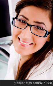close view of smiling female with eyewear with white background