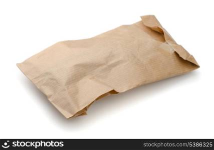 Closed crumpled paper package isolated on white