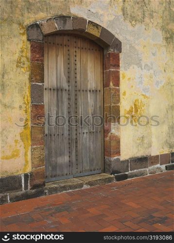 Closed door in a wall, Old Panama, Panama City, Panama