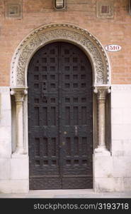 Closed door of a building, Venice, Italy