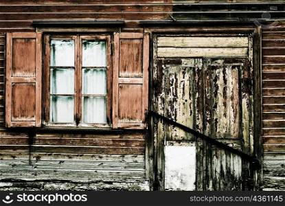 Closed door of a wooden house