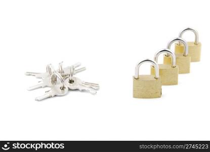 closed golden padlocks with keys isolated on white background