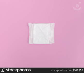 closed sanitary towel pink background