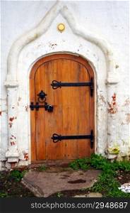Closed wooden door - Detail of old white church
