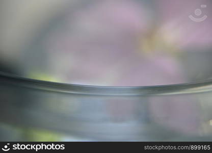 closer look at polished glass edge with pink flower on the back