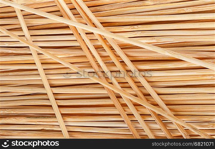 Closeup abstract background of crossed bamboo sticks