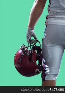 closeup American Football Player isolated on colorfull backgroun. Closeup Portrait of a strong muscular American Football Player isolated on colorful background