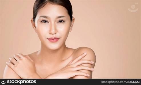 Closeup ardent young woman with healthy clear skin and soft makeup looking at camera and posing beauty gesture. Cosmetology skincare and beauty concept.. Closeup ardent young woman posing beauty gesture with clean fresh skin.