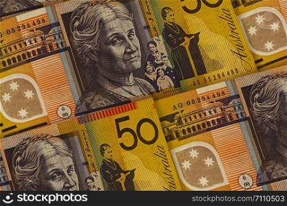 Closeup Australian dollars banknotes background. AUD pattern. 50