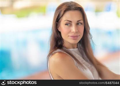 Closeup authentic portrait of a beautiful brunette woman outdoors, genuine beauty of a female with natural makeup, sensuality and feminity concept. Authentic woman portrait