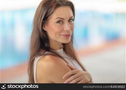 Closeup authentic portrait of a beautiful brunette woman outdoors, genuine beauty of a female with natural makeup, happy healthy lifestyle. Authentic woman portrait