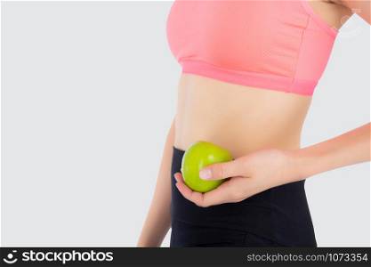 Closeup beautiful young asian woman in sport clothing satisfied and holding green apple isolated on white background, girl asia have shape and wellness, exercise for fit with health concept.