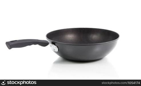 Closeup black frying pan isolated on over white background