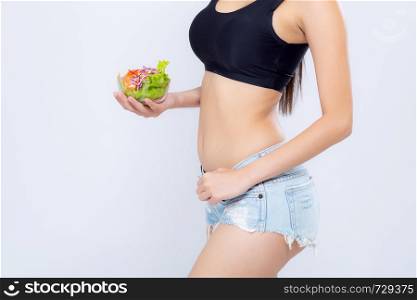 Closeup body beautiful asian woman holding salad vegetable food isolated on white background, girl touch waist and diet vegetarian for healthy, health care or wellness concept.