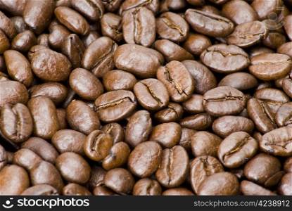 Closeup brown coffe beans background texture