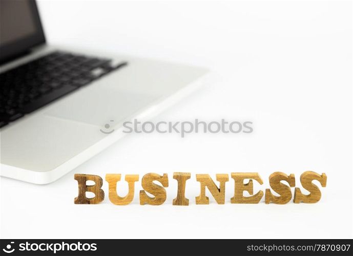 closeup business wording and laptop, enterprise and company concept and idea