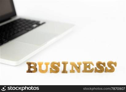 closeup business wording and laptop, enterprise and company concept and idea