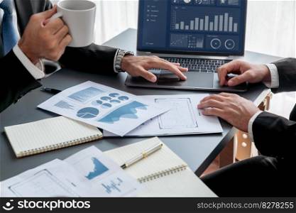 Closeup busy analyst team with coffee discuss financial data on digital dashboard, analyzing chart and graph using business technology display on laptop screen. Fintech business intelligence. Fervent. Closeup busy analyst team with coffee discuss financial data on laptop. Fervent