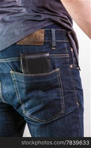 Closeup. Careless man with wallet on his back pocket. Risk of theft. Isolated on white. Studio shot.
