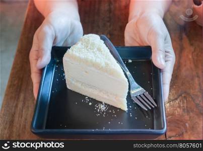 Closeup cheese cake on black plate, stock photo