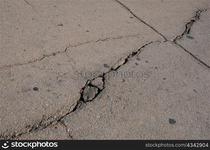Closeup cracked asphalt pavement