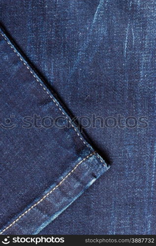 closeup detail of blue denim jeans trouses , texture background