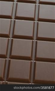 Closeup detail of brown chocolate bar.