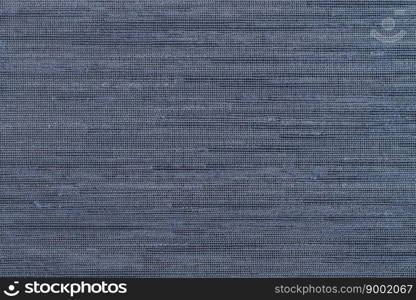 Closeup detail of coarse blue fabric background