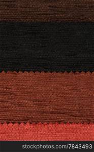 Closeup detail of multi color fabric texture samples.