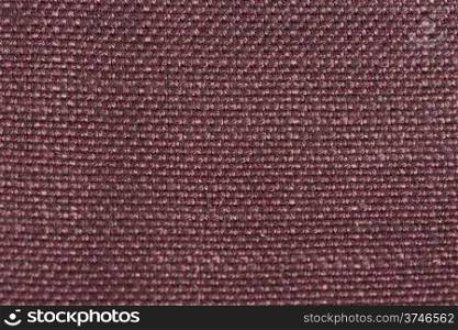 Closeup detail of pink fabric texture background