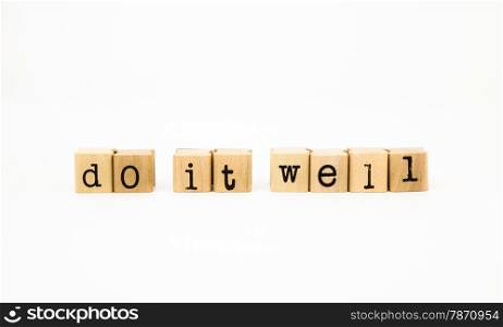 closeup do it well wording isolate on white background, motto and principal concept and idea
