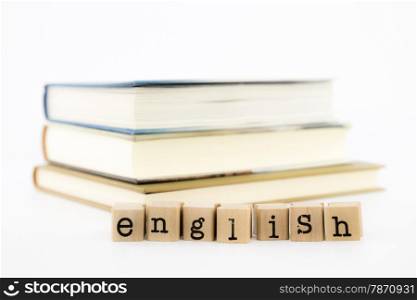closeup english wording and books. english for foreigner, tutorial and learning concept and idea.