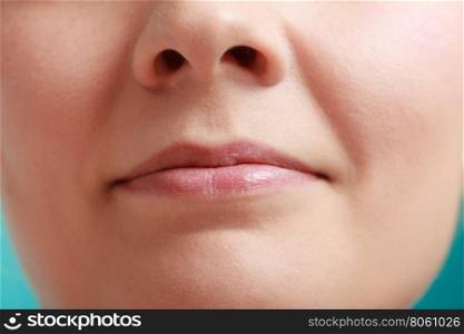 Closeup glossy female lips. Part of face.. Closeup shiny glossy female lips. Part of face.