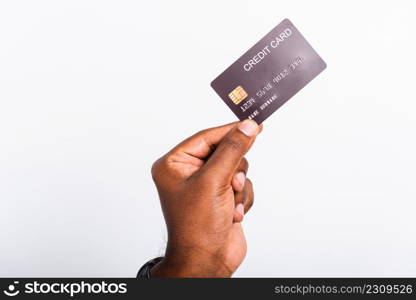 Closeup hand black man holding bank mockup money credit card on hand for payment transfer, studio shot isolated on white background