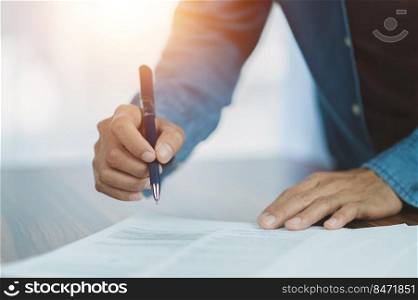 Closeup hand sign on document,  signature contract executive