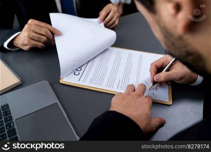 Closeup hand signing contract document with pen, sealing business deal with signature. Businesspeople finalizing business agreement by writing down signature on contract paper. Fervent. Closeup hand signing contract document with pen. Fervent.