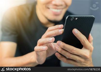 Closeup hand using mobile smartphone